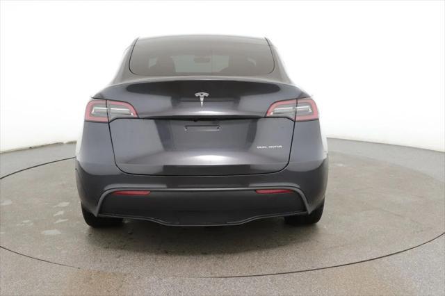 used 2024 Tesla Model Y car, priced at $33,995