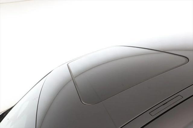 used 2024 BMW i5 car, priced at $53,995