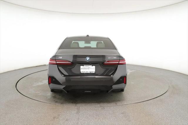 used 2024 BMW i5 car, priced at $53,995
