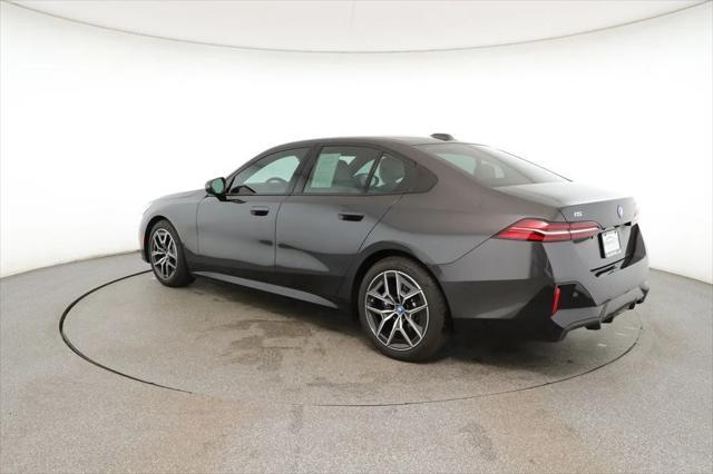 used 2024 BMW i5 car, priced at $53,995