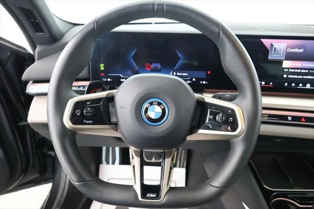 used 2024 BMW i5 car, priced at $53,995