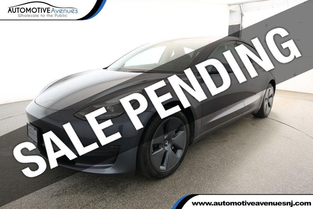 used 2023 Tesla Model 3 car, priced at $23,995