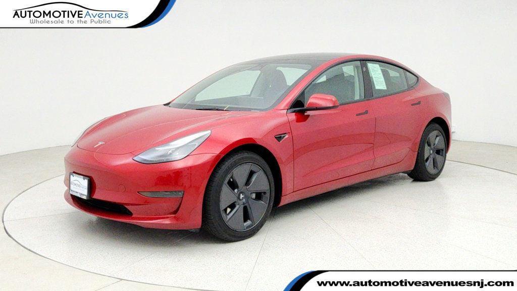 used 2023 Tesla Model 3 car, priced at $21,495