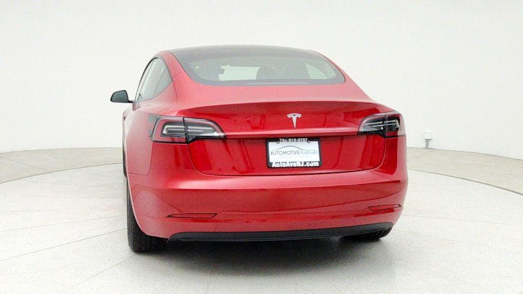 used 2023 Tesla Model 3 car, priced at $21,495