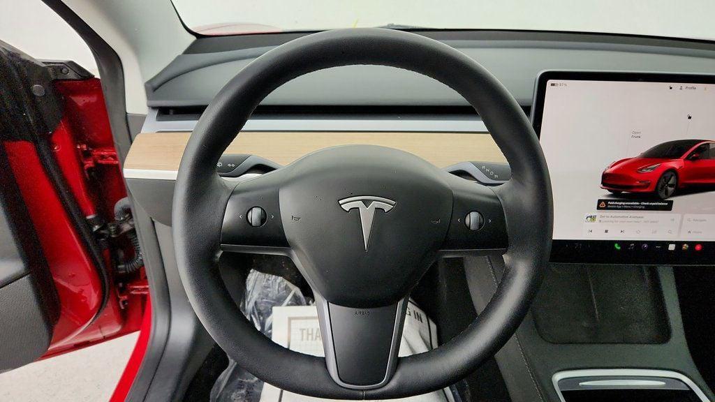 used 2023 Tesla Model 3 car, priced at $21,495