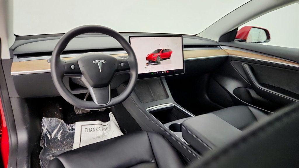 used 2023 Tesla Model 3 car, priced at $21,495