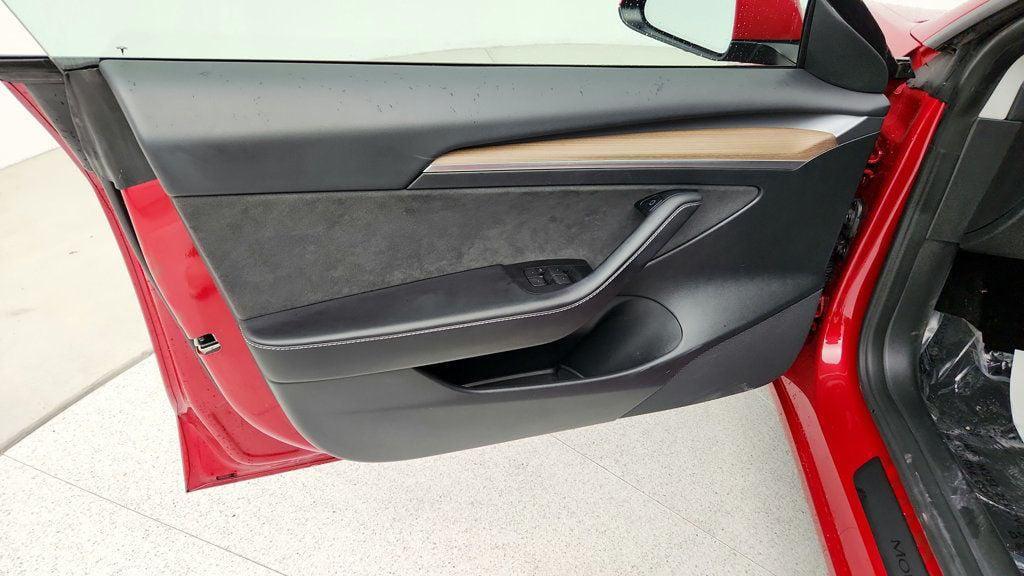 used 2023 Tesla Model 3 car, priced at $21,495