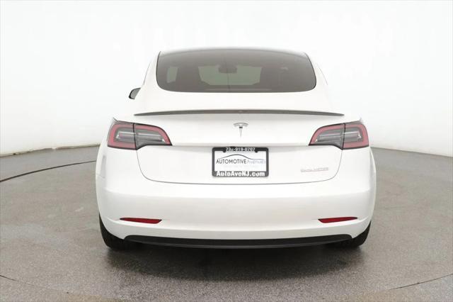 used 2023 Tesla Model 3 car, priced at $34,995