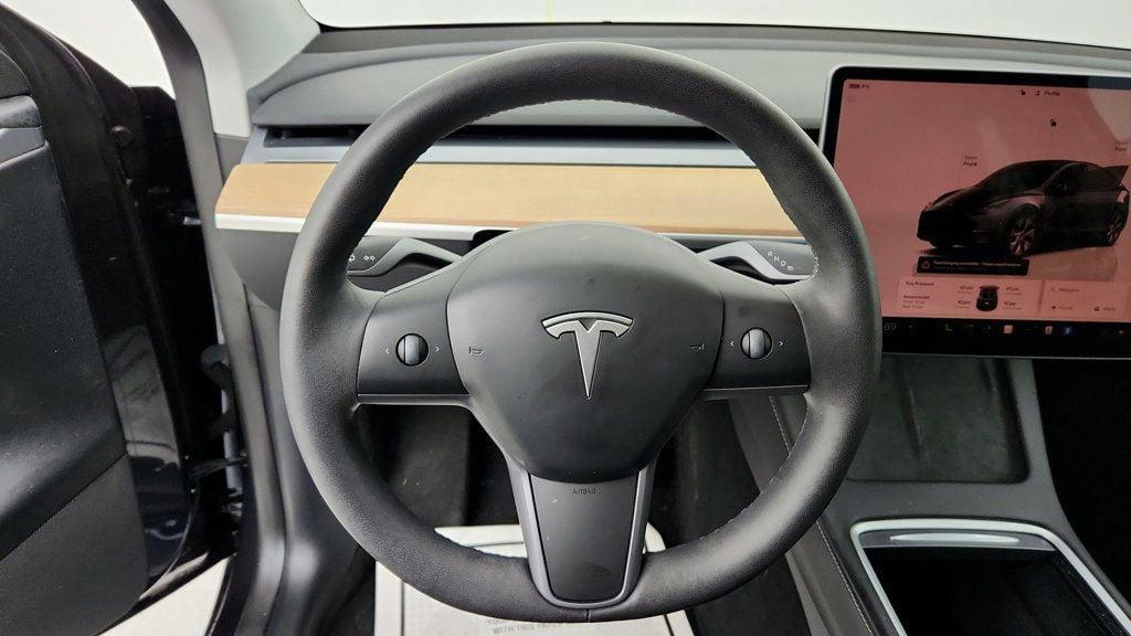 used 2024 Tesla Model Y car, priced at $32,995