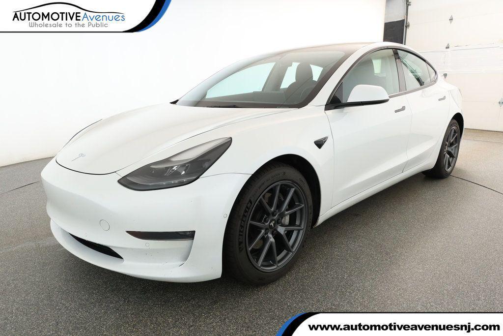 used 2022 Tesla Model 3 car, priced at $19,995
