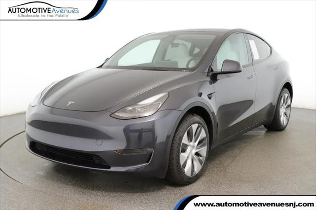 used 2024 Tesla Model Y car, priced at $34,995