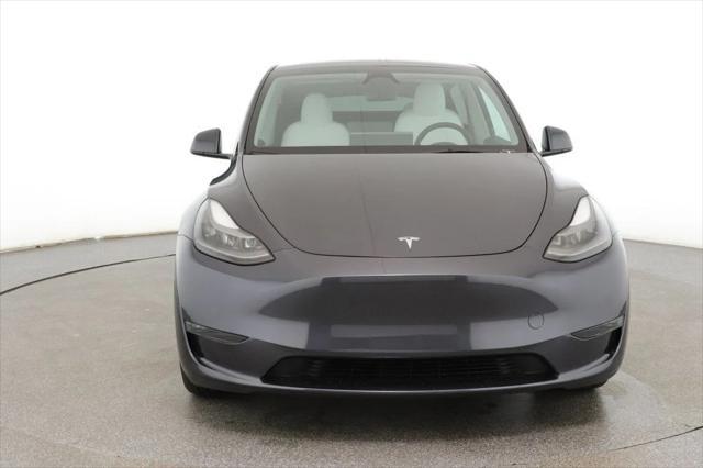 used 2024 Tesla Model Y car, priced at $34,995