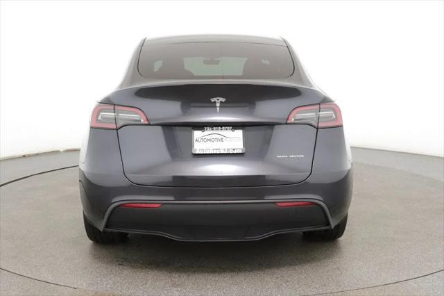 used 2024 Tesla Model Y car, priced at $34,995