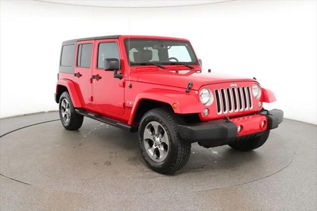 used 2016 Jeep Wrangler Unlimited car, priced at $23,495