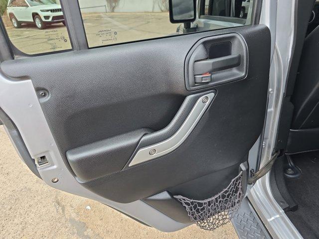 used 2015 Jeep Wrangler Unlimited car, priced at $23,923