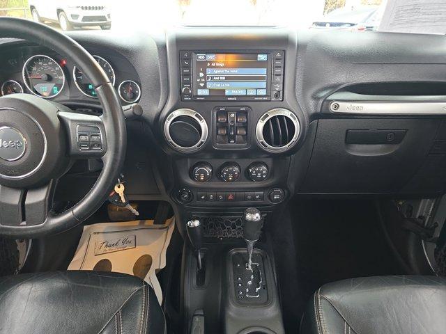 used 2015 Jeep Wrangler Unlimited car, priced at $23,923