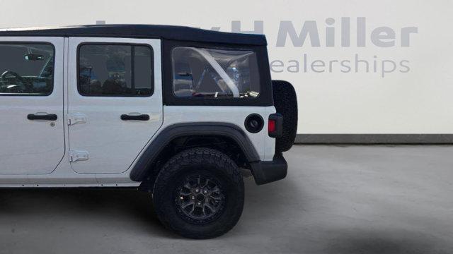 used 2022 Jeep Wrangler Unlimited car, priced at $32,808