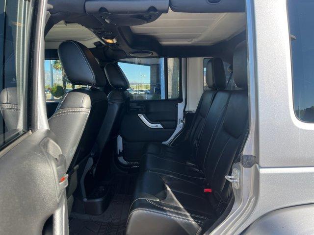 used 2014 Jeep Wrangler Unlimited car, priced at $19,564