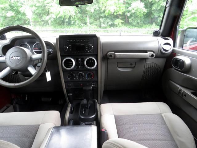 used 2010 Jeep Wrangler Unlimited car, priced at $9,997