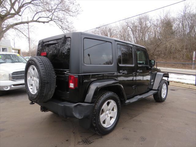 used 2011 Jeep Wrangler Unlimited car, priced at $11,997