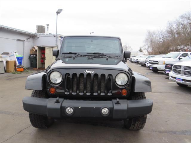 used 2011 Jeep Wrangler Unlimited car, priced at $11,997