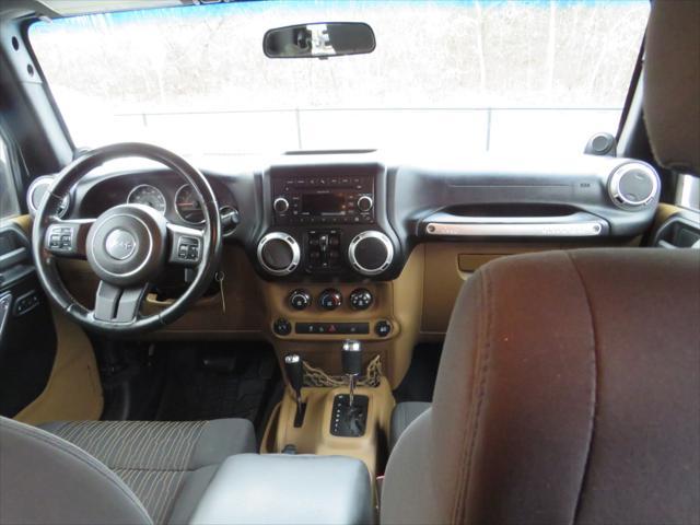 used 2011 Jeep Wrangler Unlimited car, priced at $11,997