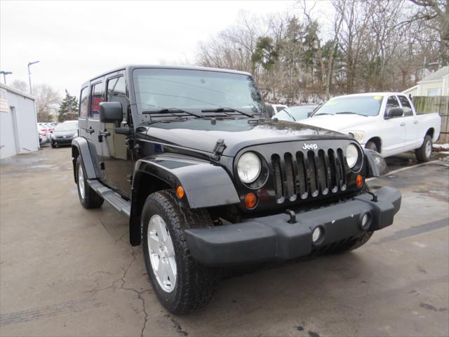 used 2011 Jeep Wrangler Unlimited car, priced at $11,997