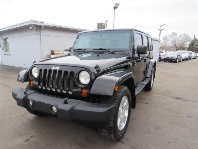 used 2011 Jeep Wrangler Unlimited car, priced at $11,997