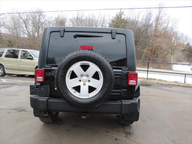 used 2011 Jeep Wrangler Unlimited car, priced at $11,997