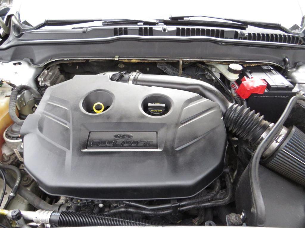 used 2016 Ford Fusion car, priced at $4,997