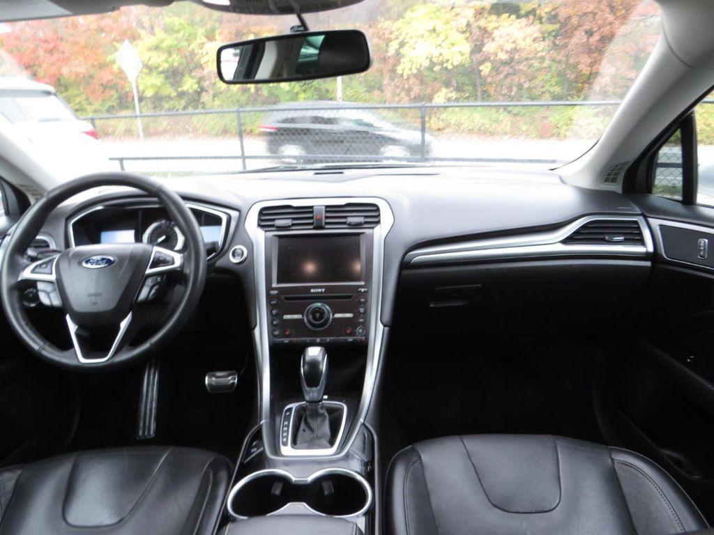 used 2016 Ford Fusion car, priced at $4,997