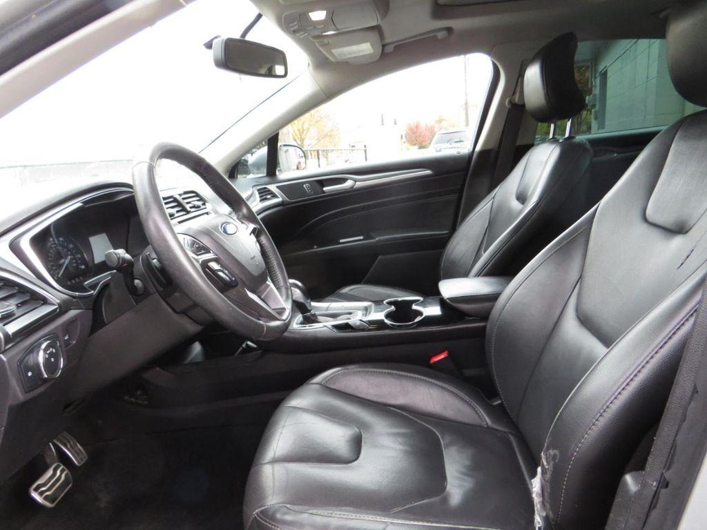 used 2016 Ford Fusion car, priced at $4,997