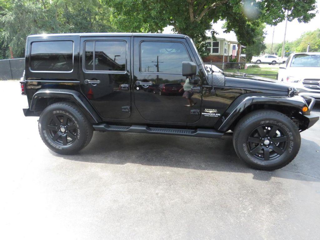 used 2013 Jeep Wrangler Unlimited car, priced at $10,997