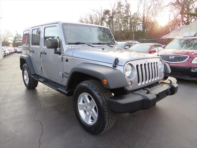 used 2014 Jeep Wrangler Unlimited car, priced at $15,997