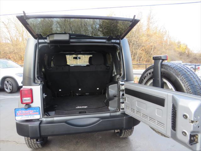 used 2014 Jeep Wrangler Unlimited car, priced at $15,997