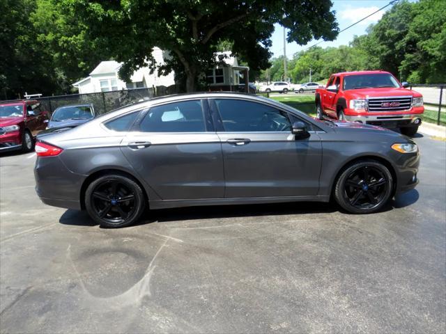 used 2016 Ford Fusion car, priced at $7,997