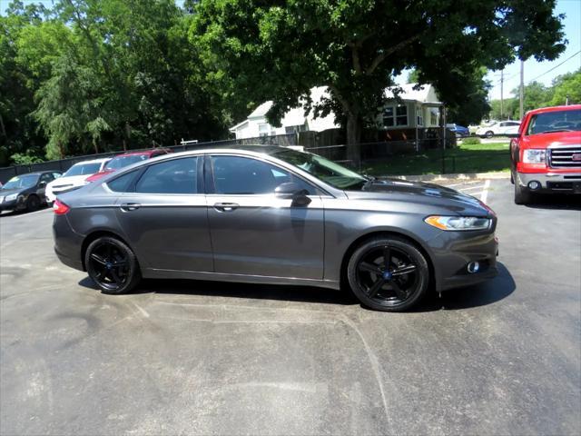 used 2016 Ford Fusion car, priced at $7,997
