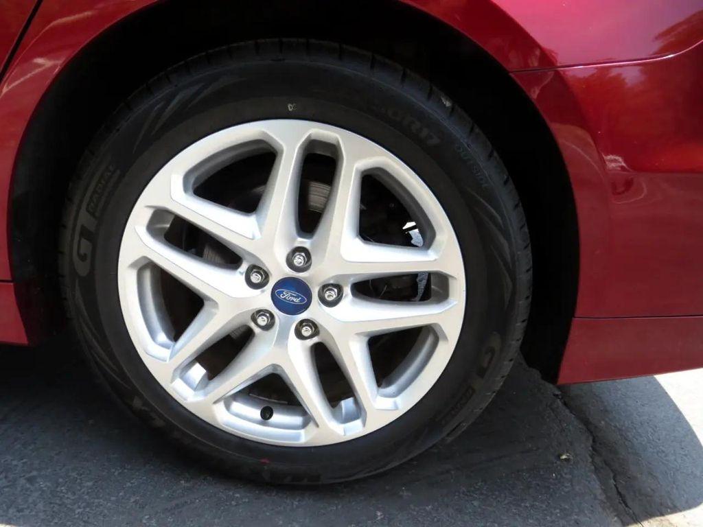used 2013 Ford Fusion car, priced at $5,497