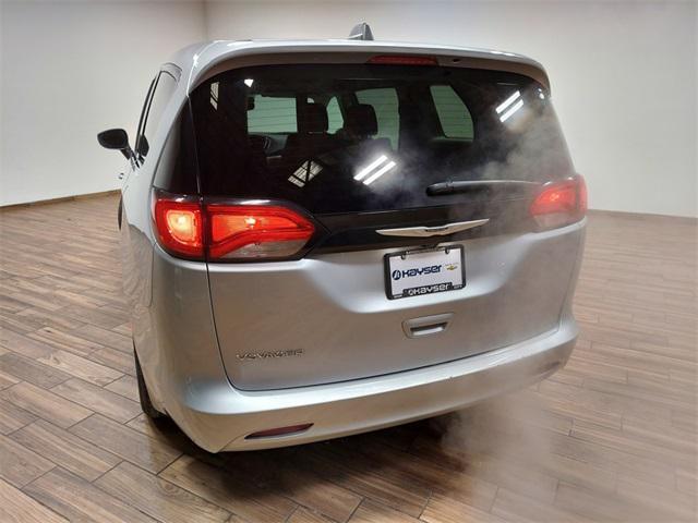 used 2023 Chrysler Voyager car, priced at $22,869