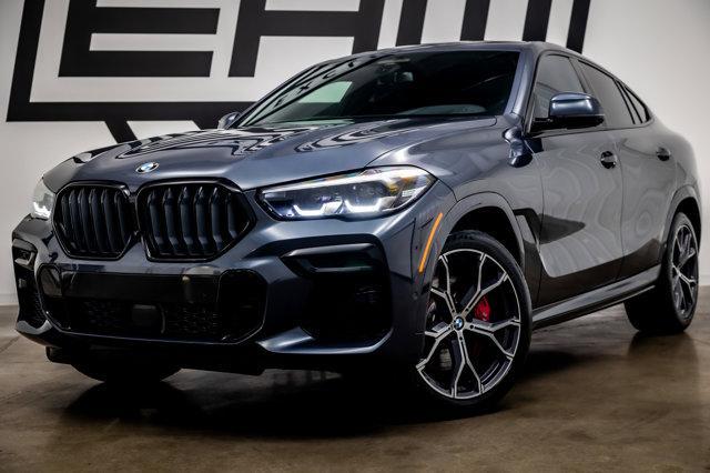 used 2022 BMW X6 car, priced at $57,997