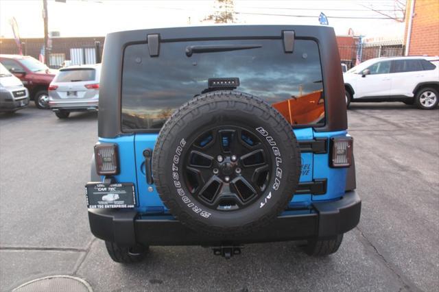 used 2016 Jeep Wrangler Unlimited car, priced at $16,990