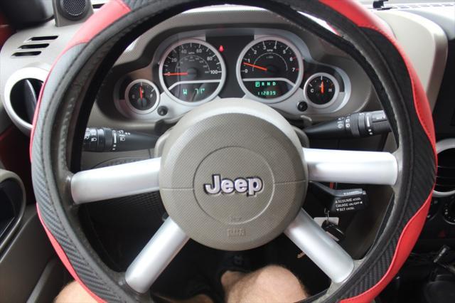 used 2009 Jeep Wrangler Unlimited car, priced at $12,990