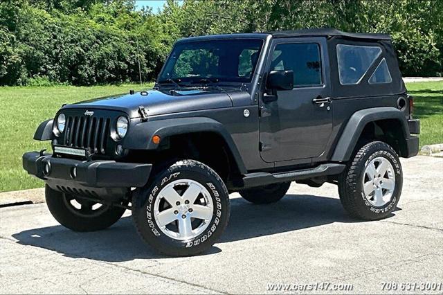 used 2014 Jeep Wrangler car, priced at $13,995