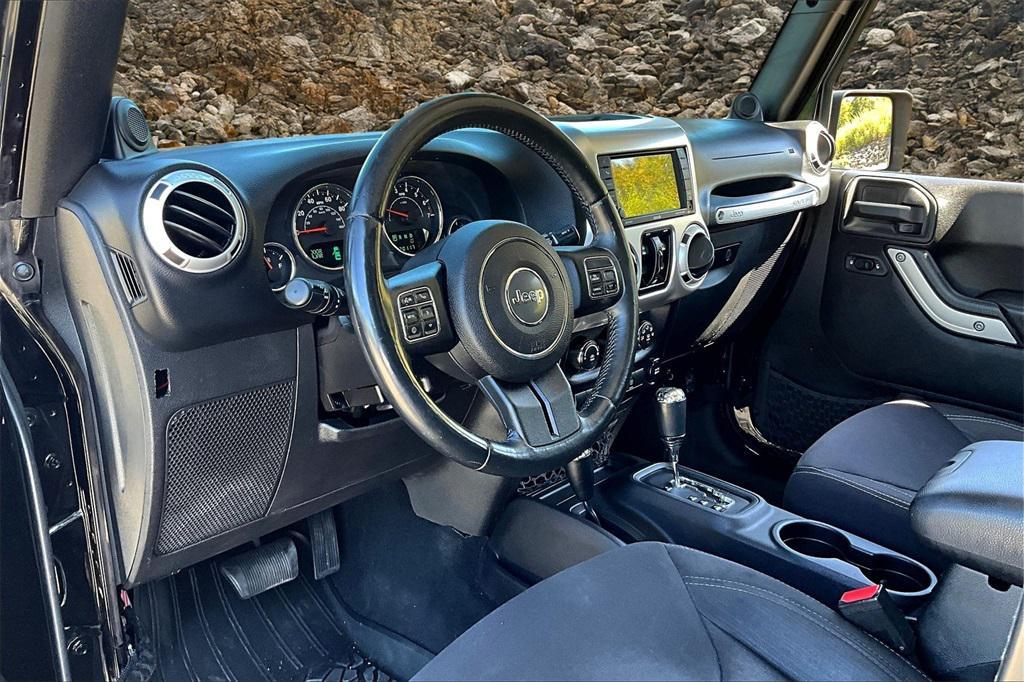 used 2014 Jeep Wrangler Unlimited car, priced at $15,495