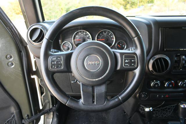 used 2015 Jeep Wrangler Unlimited car, priced at $13,995