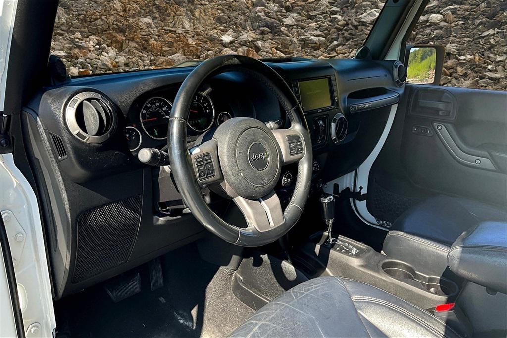 used 2013 Jeep Wrangler Unlimited car, priced at $13,495