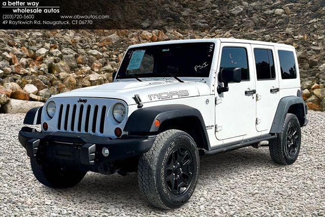 used 2013 Jeep Wrangler Unlimited car, priced at $14,995