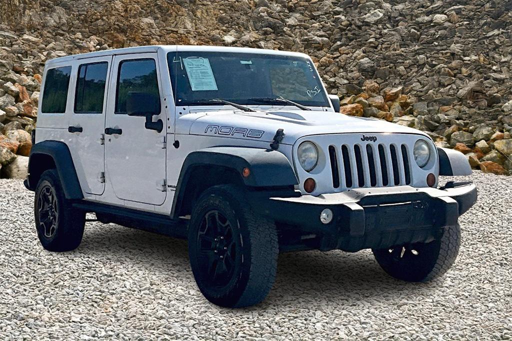 used 2013 Jeep Wrangler Unlimited car, priced at $13,495