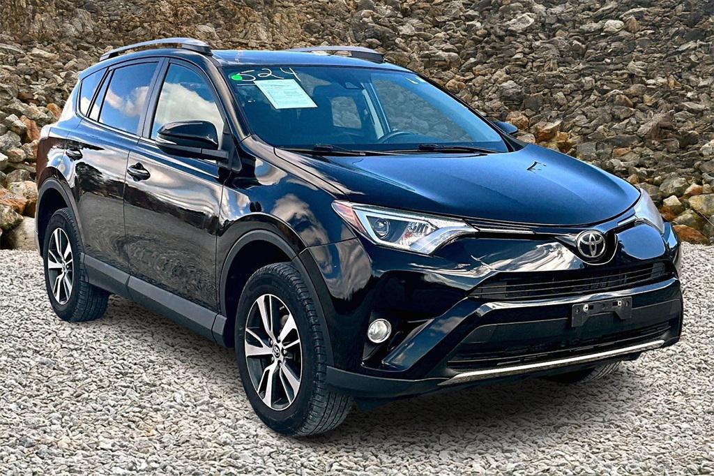 used 2018 Toyota RAV4 car, priced at $17,495