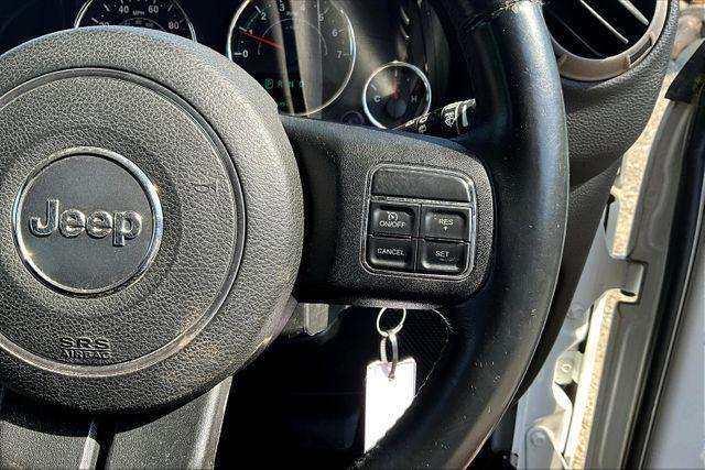 used 2014 Jeep Wrangler Unlimited car, priced at $13,995